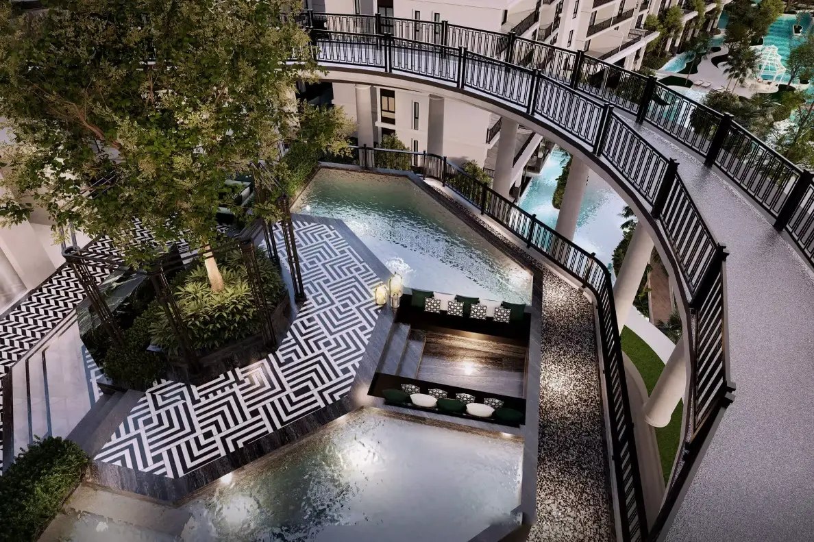 Title Heritage — aerial night view of the pool walkways